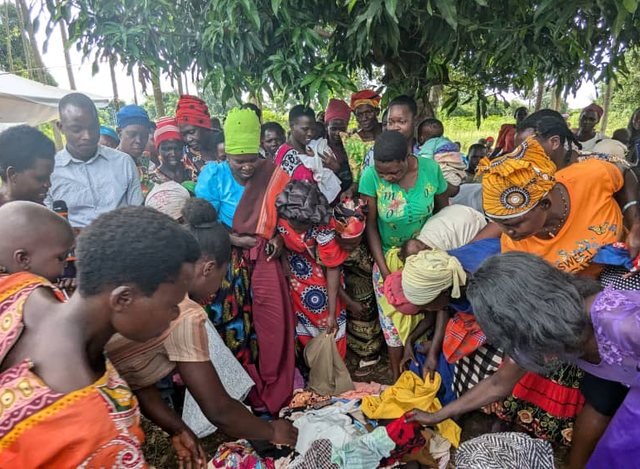 Turikumwe volunteers on a community home visit and outreach day