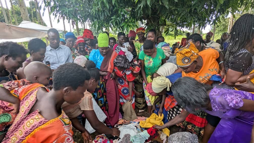 Women and children from the Turikumwe community gathered together
